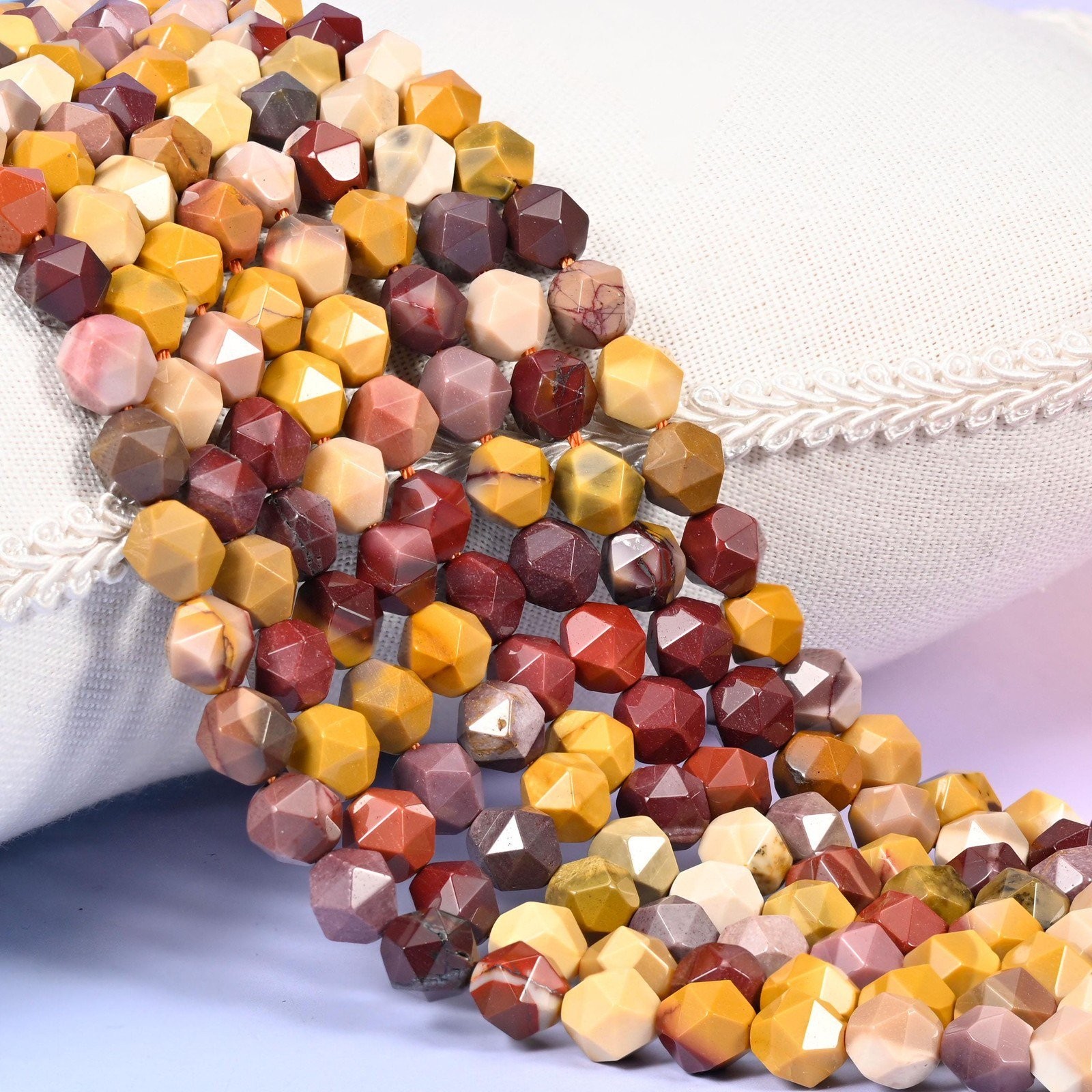 Mookaite Jasper Beads: Faceted Diamond Star Cut, 6-10mm, 15.5 inch Strand