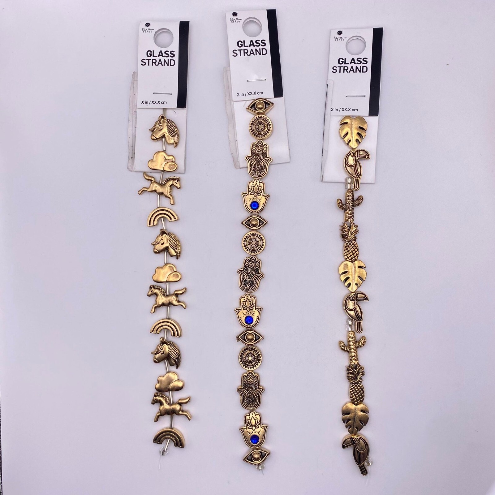 Blue Moon Metal Strand Unicorn Tropical & Amulet Gold tone and Heavy Trinkets