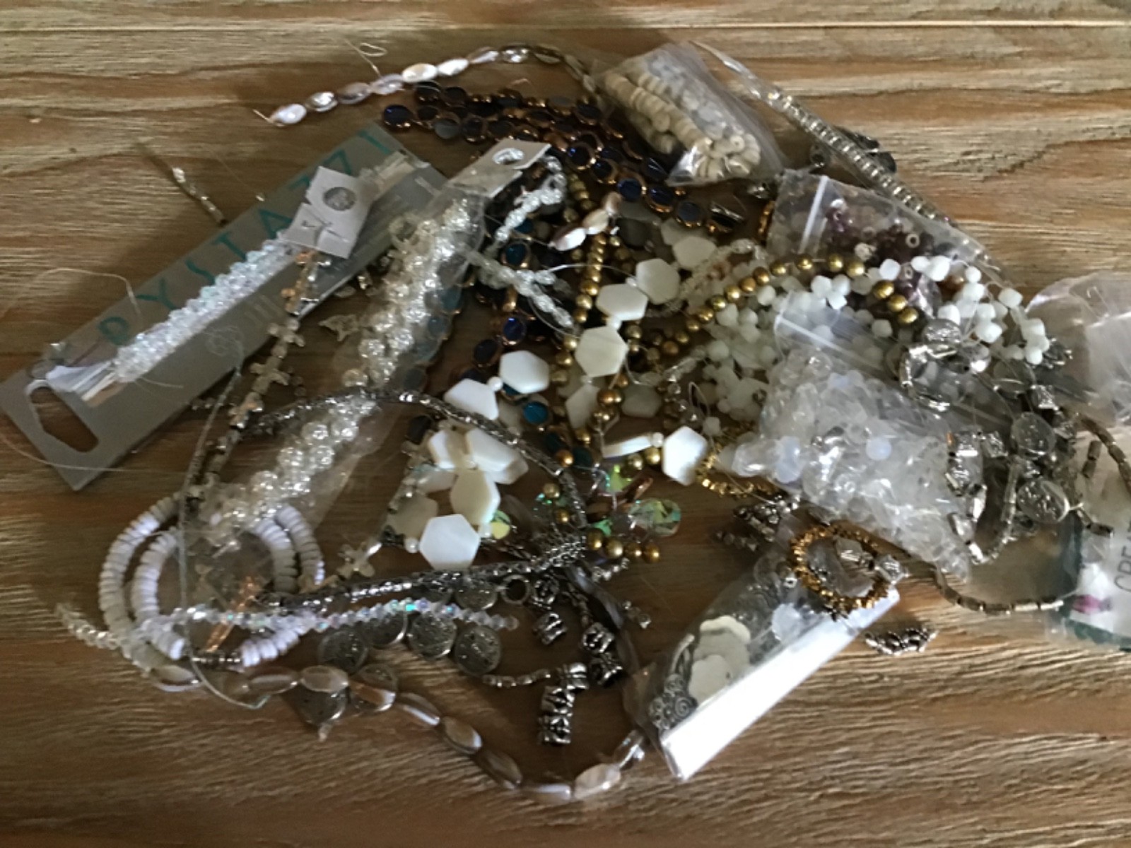 1lb glass, ceramic, stone and metal beads- as shown in picture