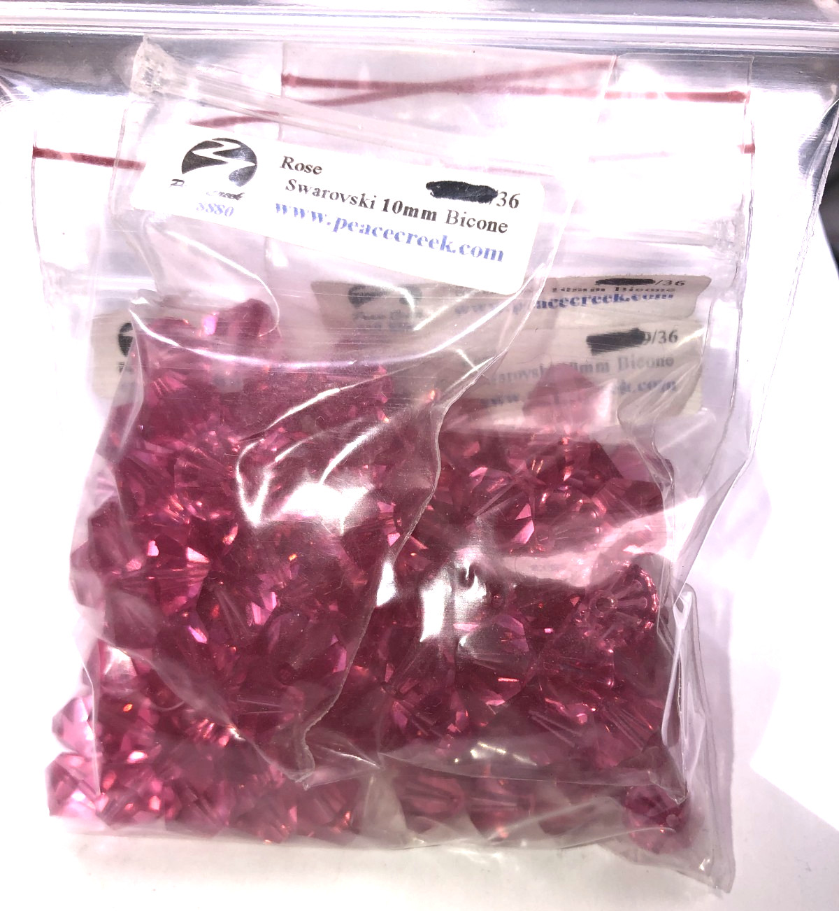 Swarovski crystal 10mm Rose #5301 (4 baggies of 36=144 beads)