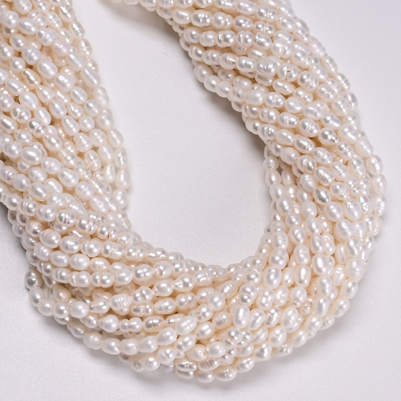 White Fresh Water Pearl Ringed Rice Shape Beads Size 3mm x 4-5mm 14” Strand