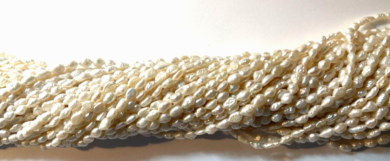 VINTAGE NATURAL WHITE FRESH WATER RICE PEARLS 16″ 7X4 MM WHOLESALE!!!
