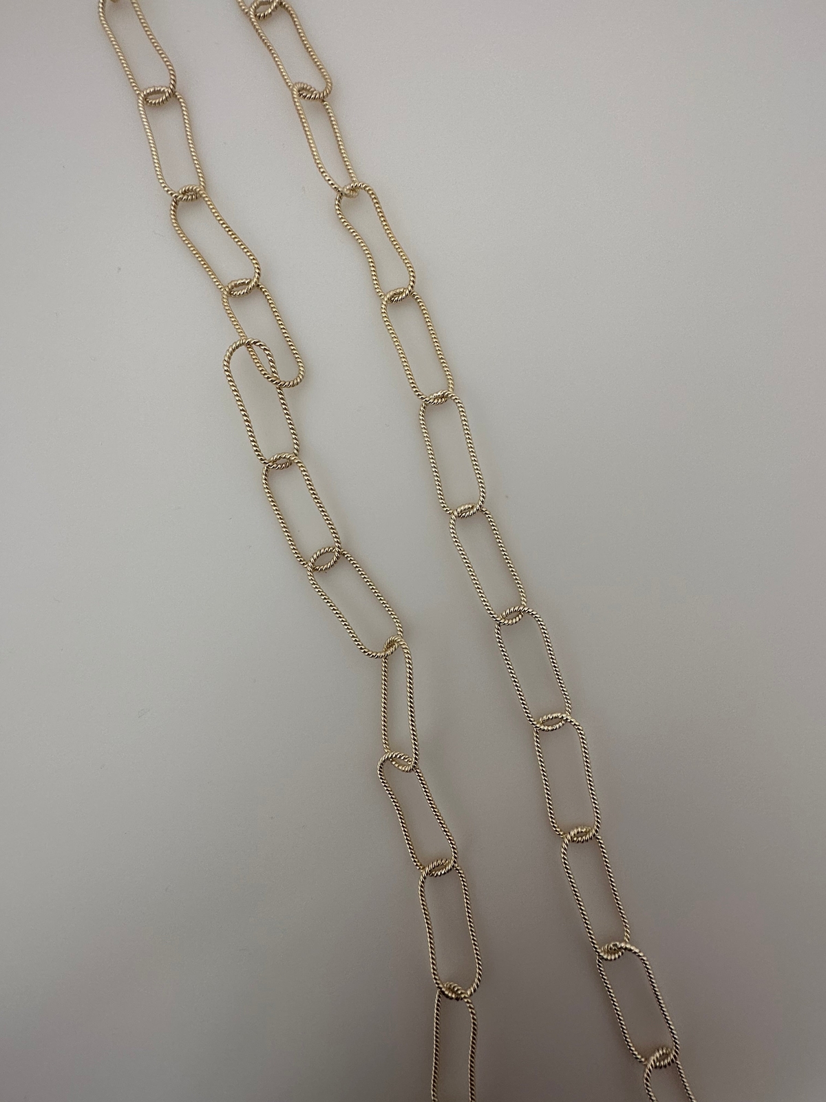 Modern Gold Finish Twisted Oval Elongated Link Chain (9 × 19 mm and 25 × 10 mm)