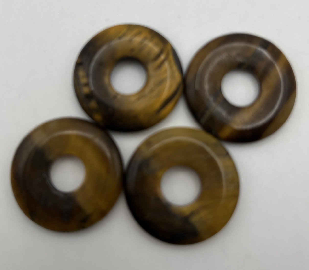 Four 25mm Tiger’s Eye Donut Beads
