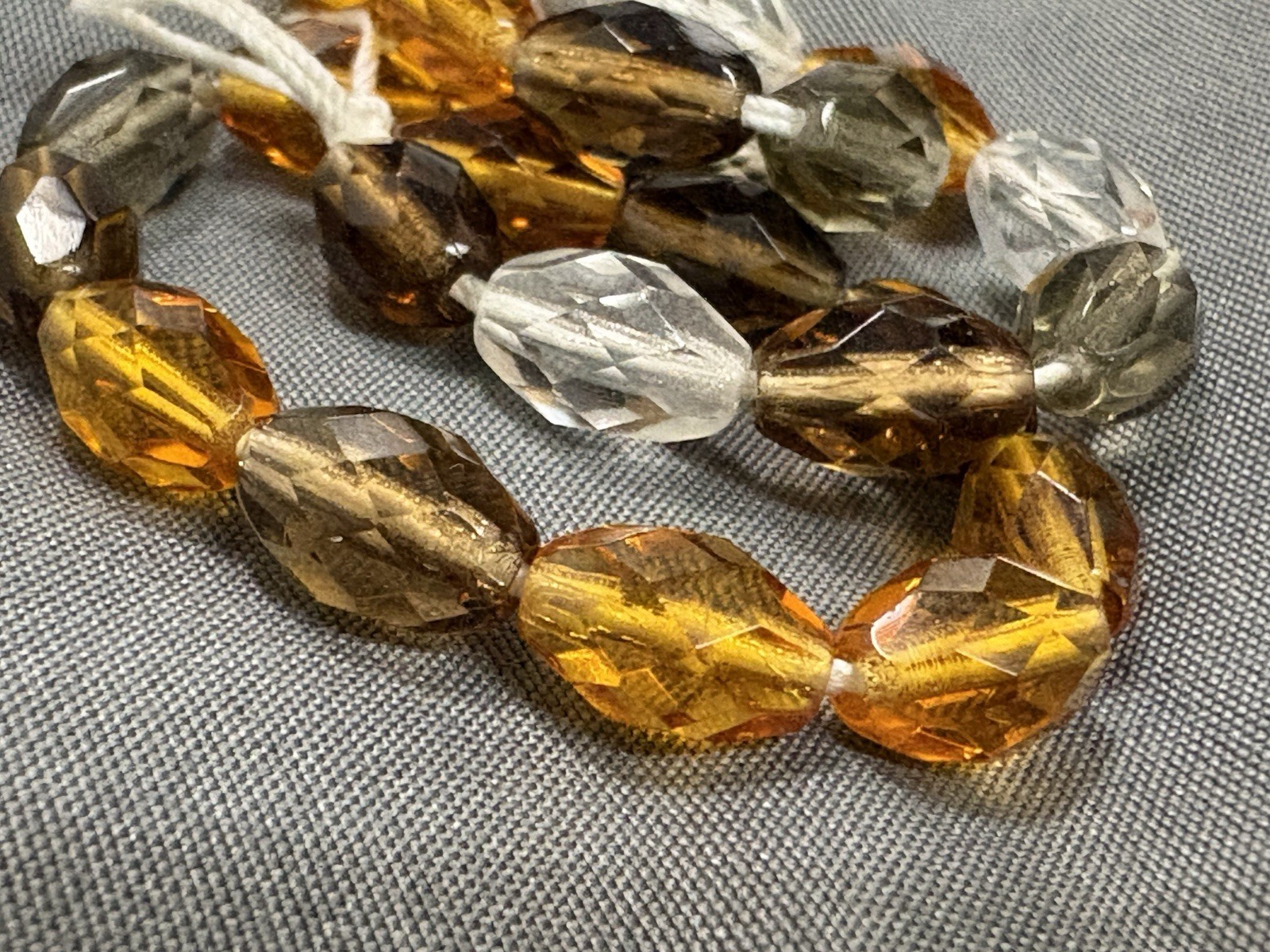 Mix Of Earth Tone Faceted Oval Beads, 10mm, 25ct, 10”, Topaz, Gold, Grey, Clear