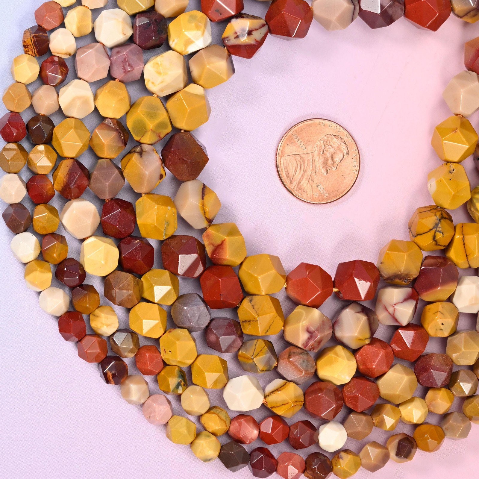Mookaite Jasper Beads: Faceted Diamond Star Cut, 6-10mm, 15.5 inch Strand