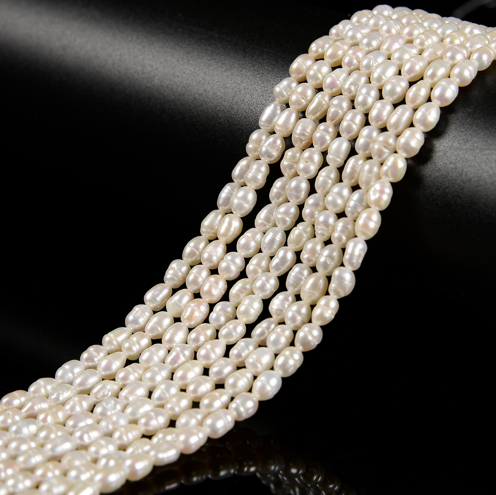 White Fresh Water Pearl Rice Shape Beads Size 4x5mm 14” Strand
