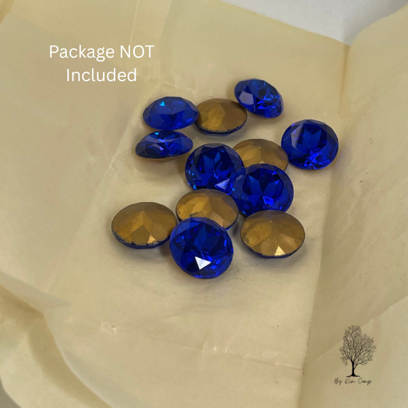 Vintage Czech 20mm Sapphire glass rhinestones in original TTC packaging. Beautif