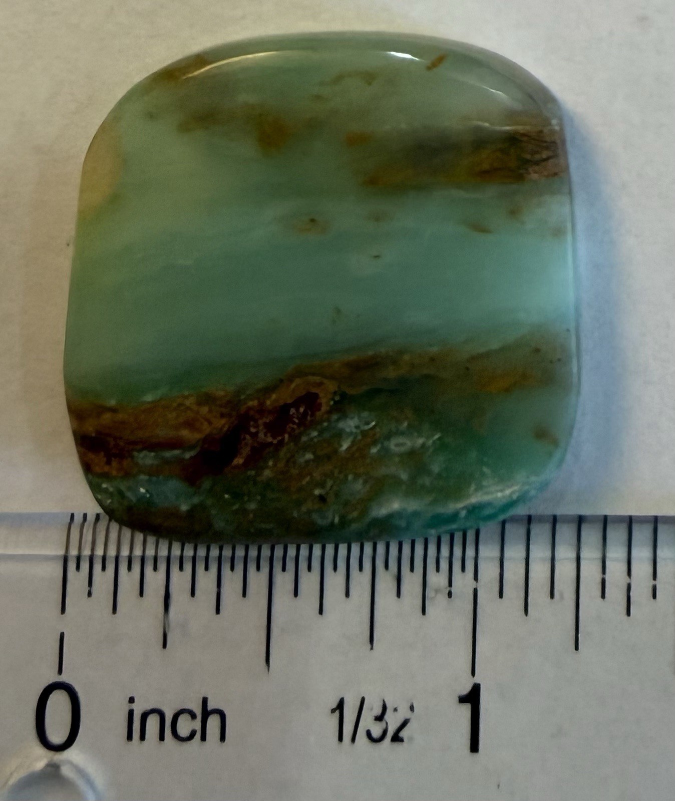 Peruvian Opal Cabochon. 1 1/4” x 1 3/16” x 1/4”, 0.3 oz. Polished all sides.