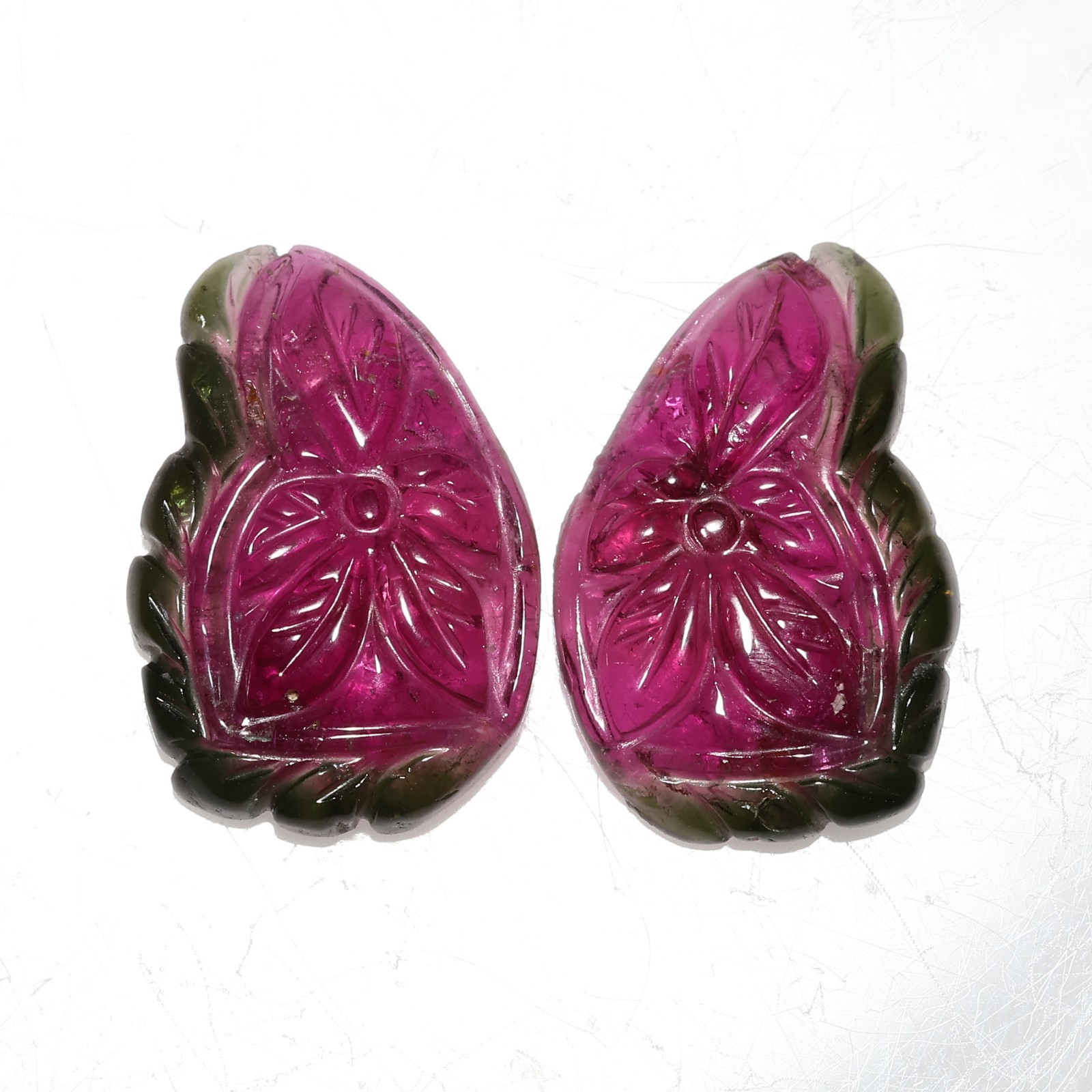 Hancarved watermelon tourmaline pair