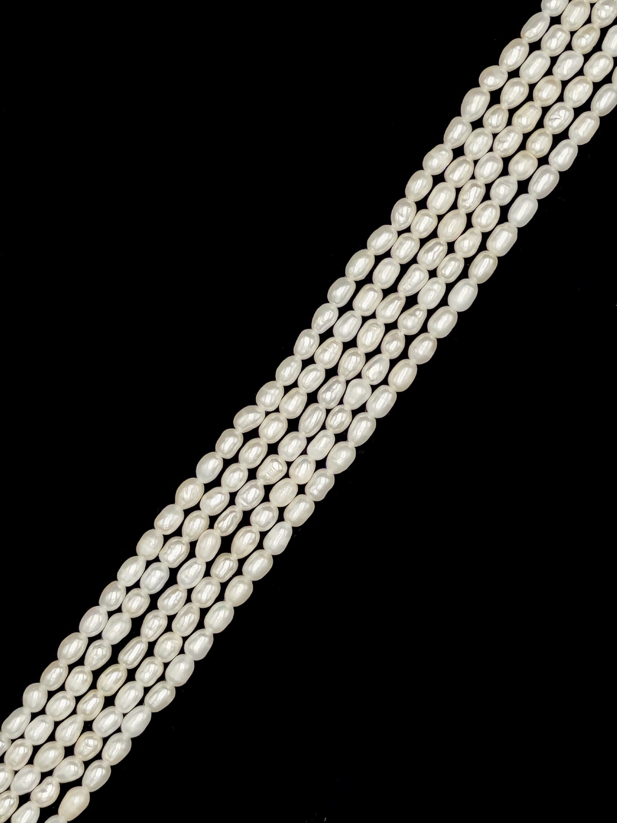 White Fresh Water Pearl Rice Shape Beads Size 4x6mm 14” Strand