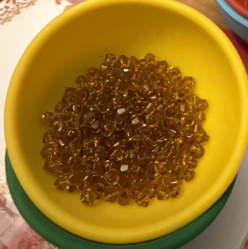 Approximately 100 4mm Glass Bicones, Clear Brown Color. Free Shipping