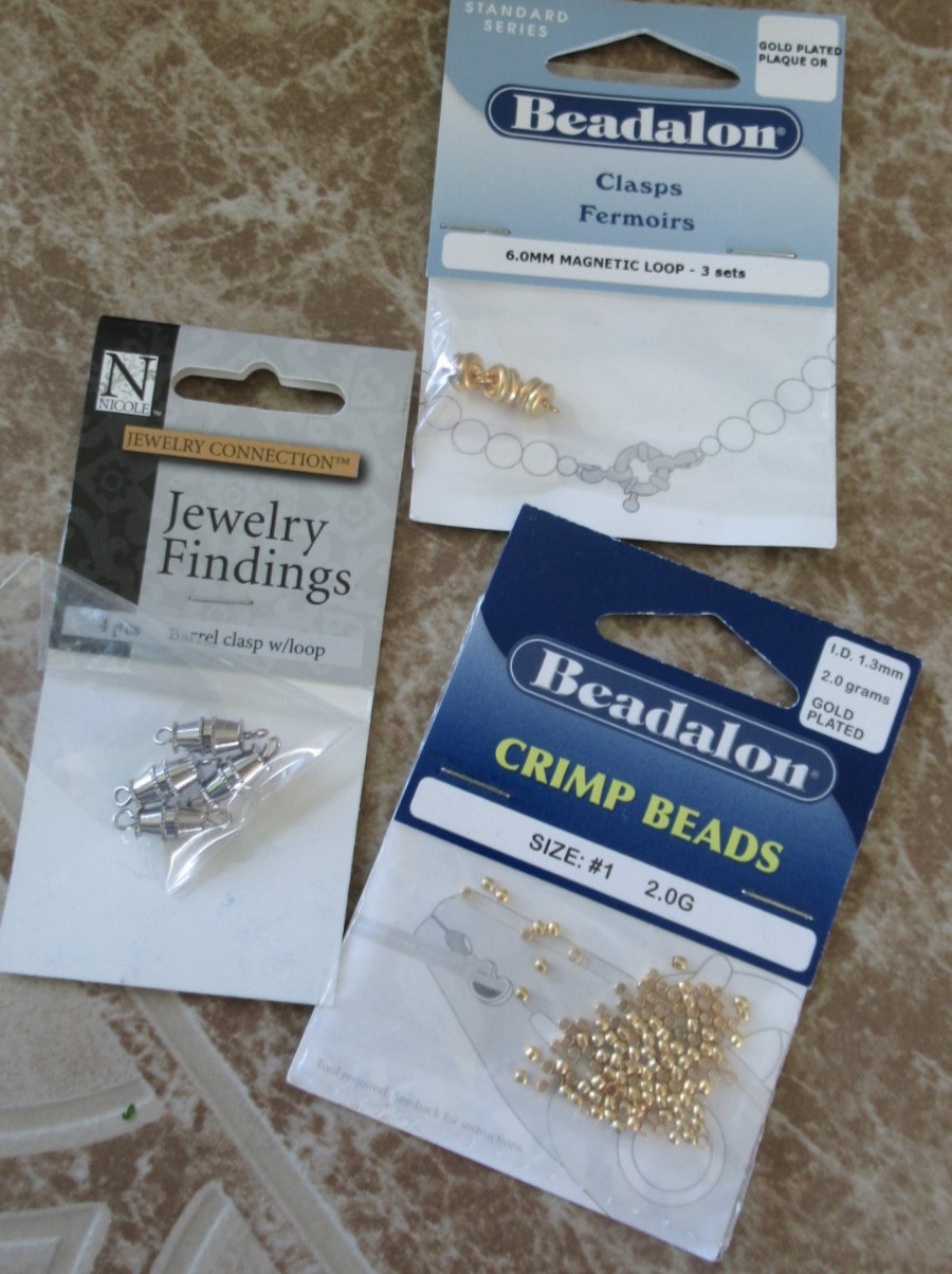 SMALL LOT OF JEWELRY MAKING SUPPLIES – PRE OWNED- WIRE, CLASPS, COVERS