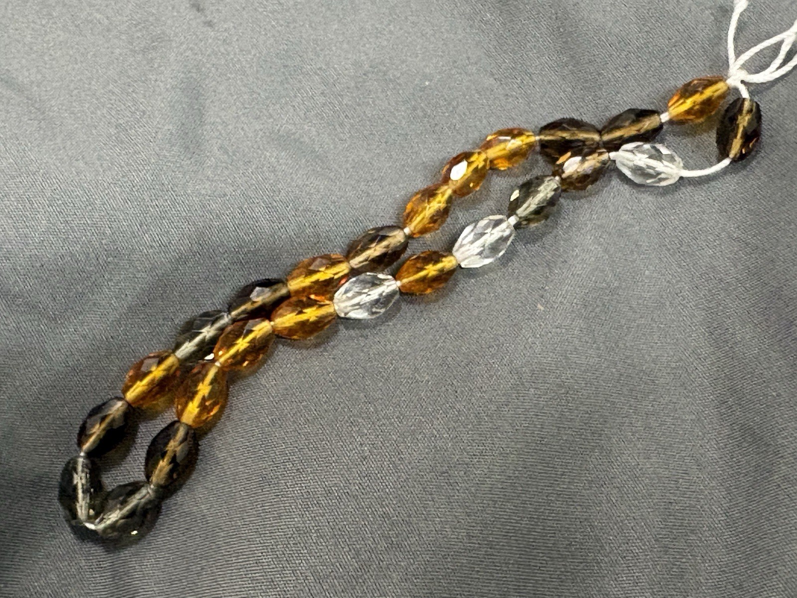 Mix Of Earth Tone Faceted Oval Beads, 10mm, 25ct, 10”, Topaz, Gold, Grey, Clear