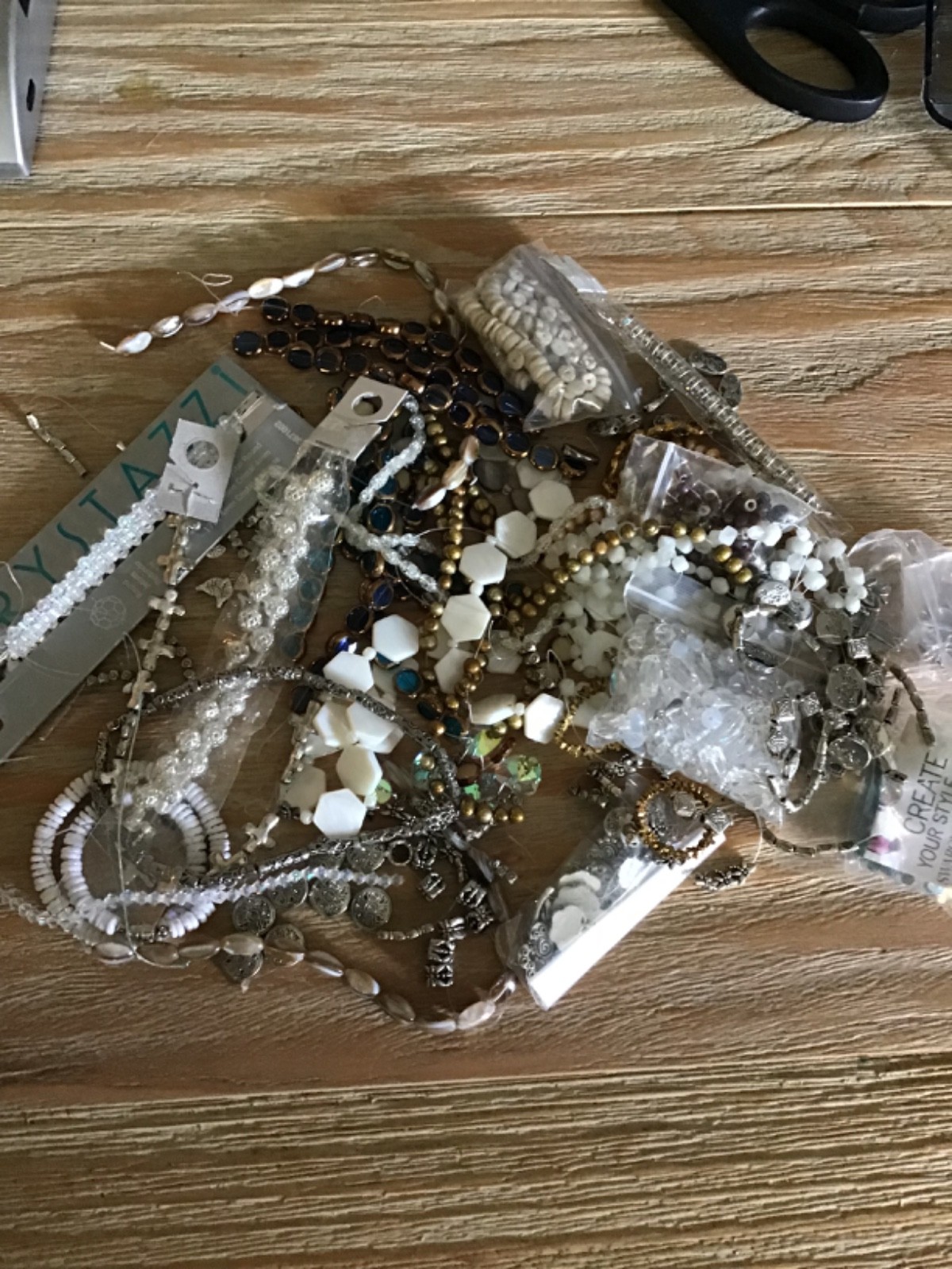 1lb glass, ceramic, stone and metal beads- as shown in picture