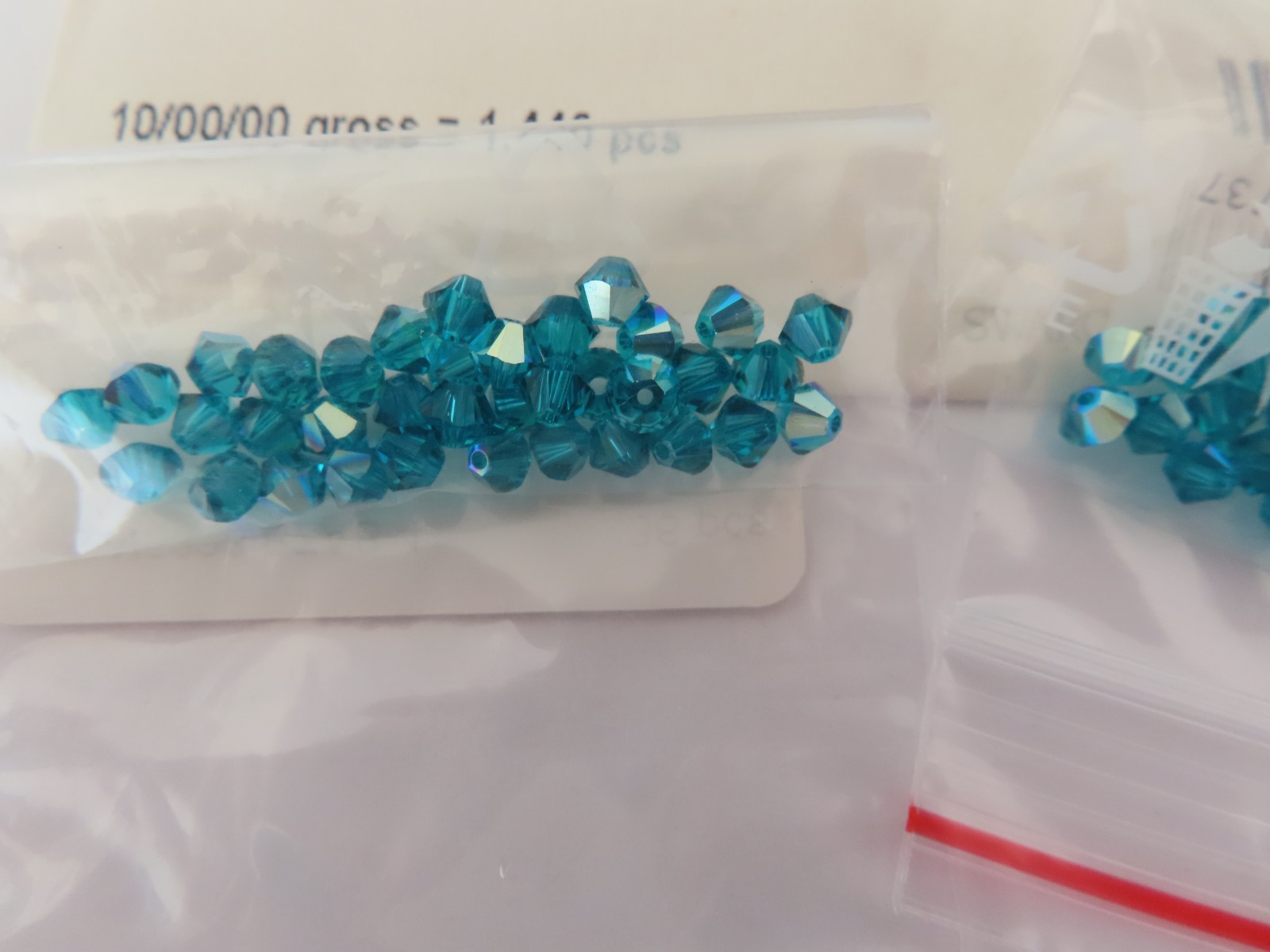 36 Swarovski Bicone Beads 4mm Blue Zircon AB #5328
