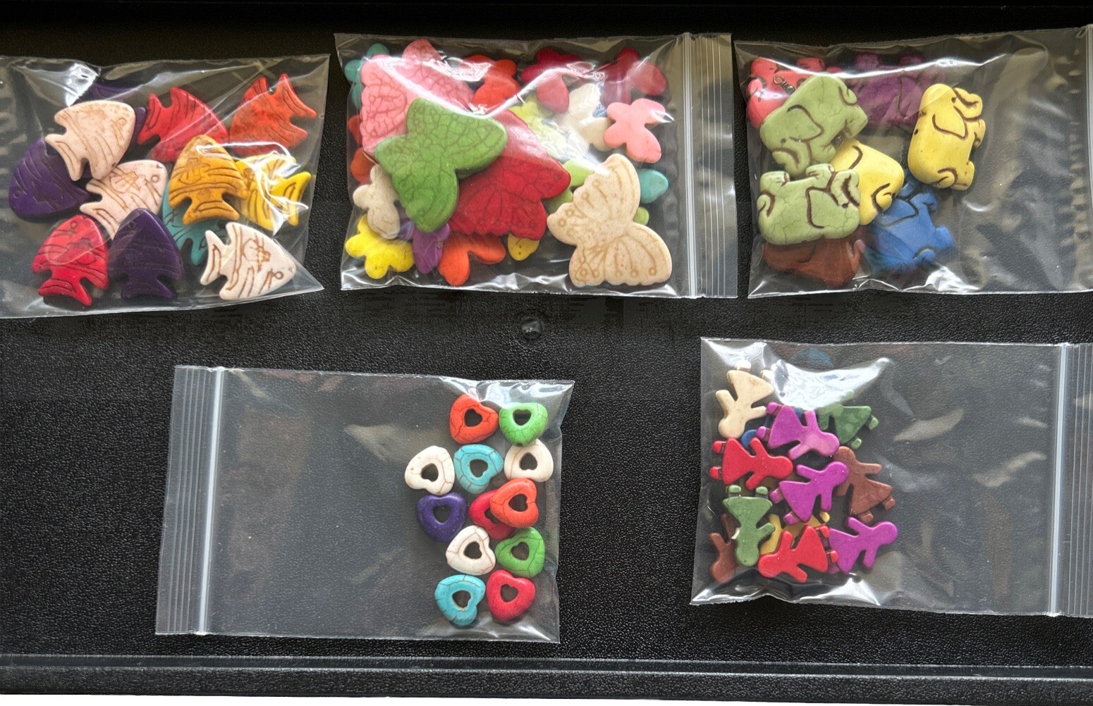 Lot of Howlite Beads Fish, Butterflies, Hearts Elephants People Mixed Sizes