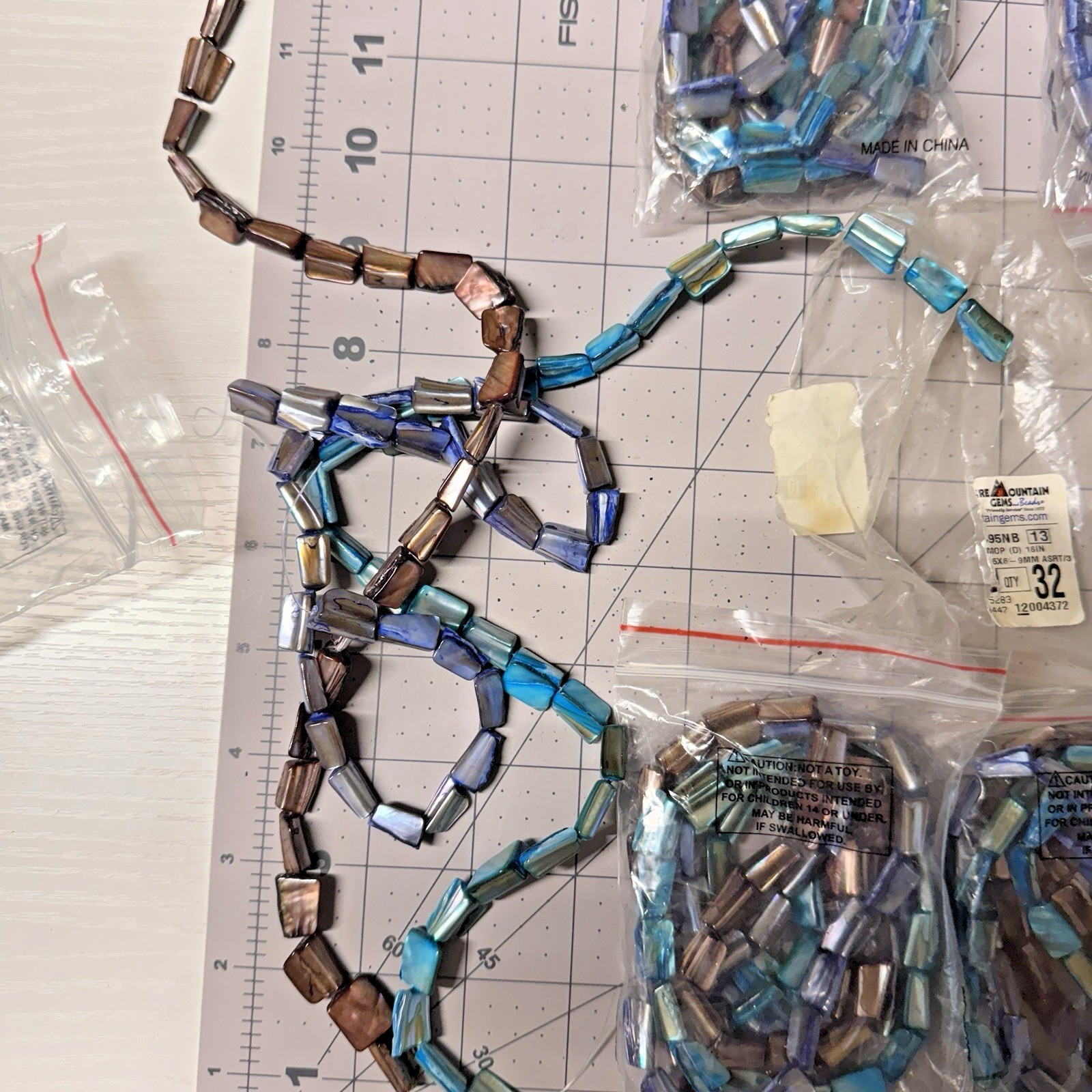 Fire Mountain Beads 7495NB – Dyed Mother-of-Pearl Strands – Lot of 10 Bags