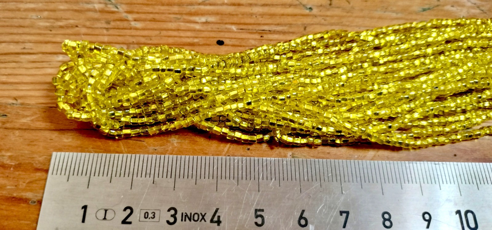Antique trading Bohemian Cadmium Glass Beads – cut sead beads on original thread