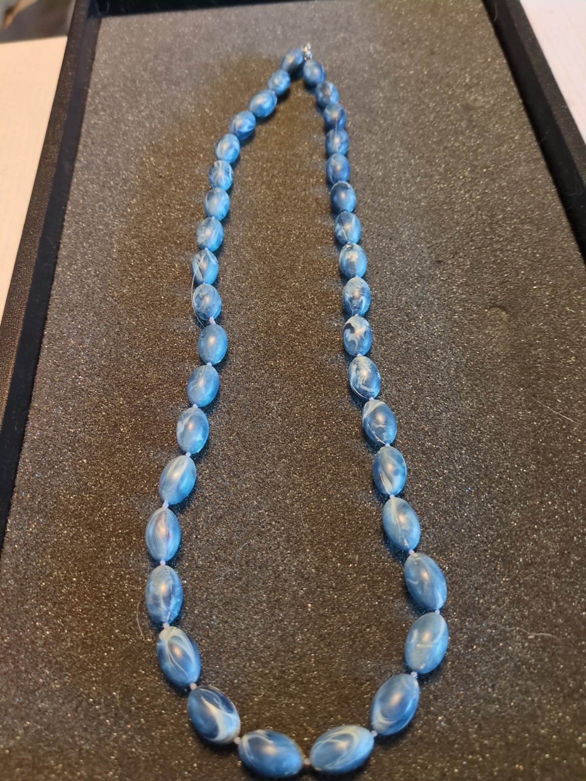 This 24″ Beauty Has Variations In Each 1/2″ Bead, On A Light Blue String.