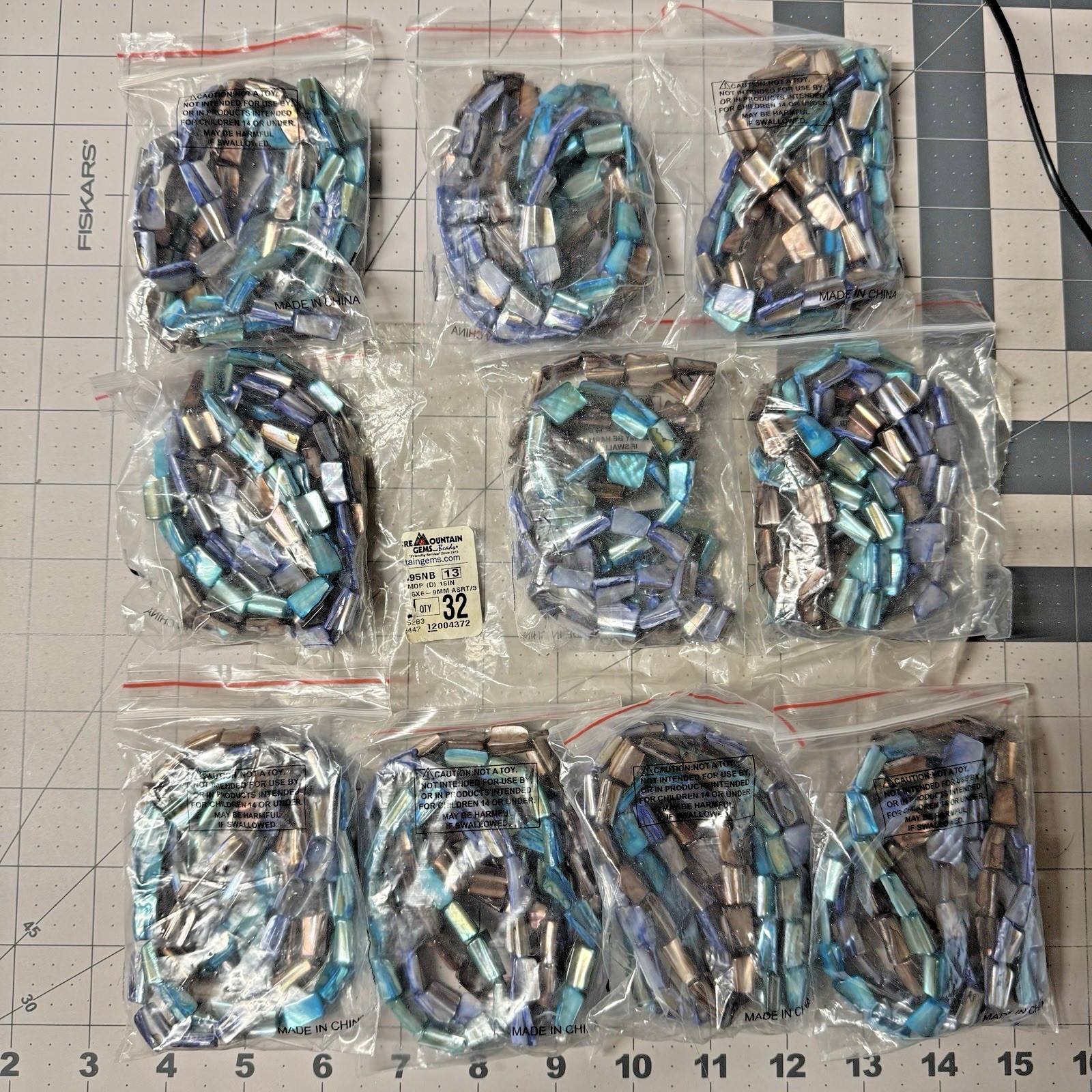 Fire Mountain Beads 7495NB – Dyed Mother-of-Pearl Strands – Lot of 10 Bags