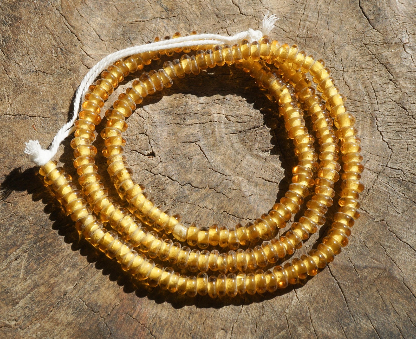 Artisan Made Topaz Glass Donut Beads: Golden Honey Color, 7mm Organic Shape