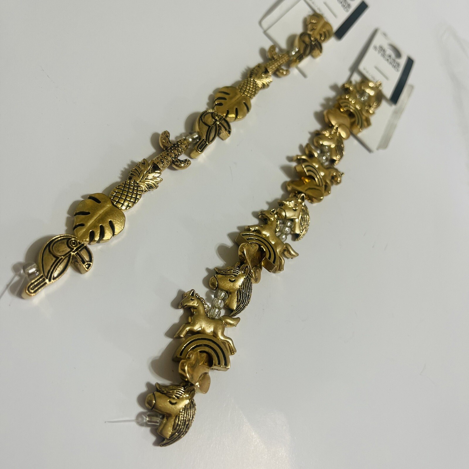 Blue Moon Metal Strand Unicorn & Tropical Gold tone and Heavy Trinkets