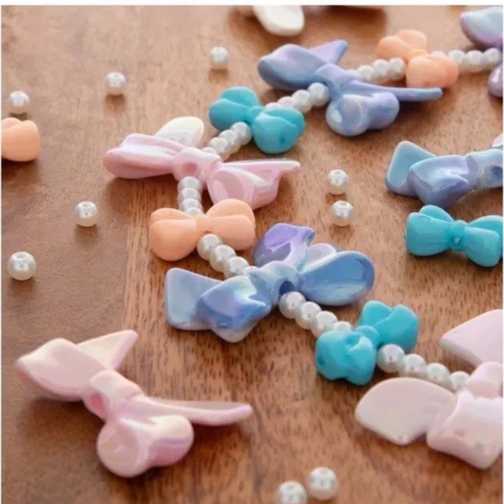 Glossy Color Gallery by Bead Treasures Acrylic Bow Bead Strand