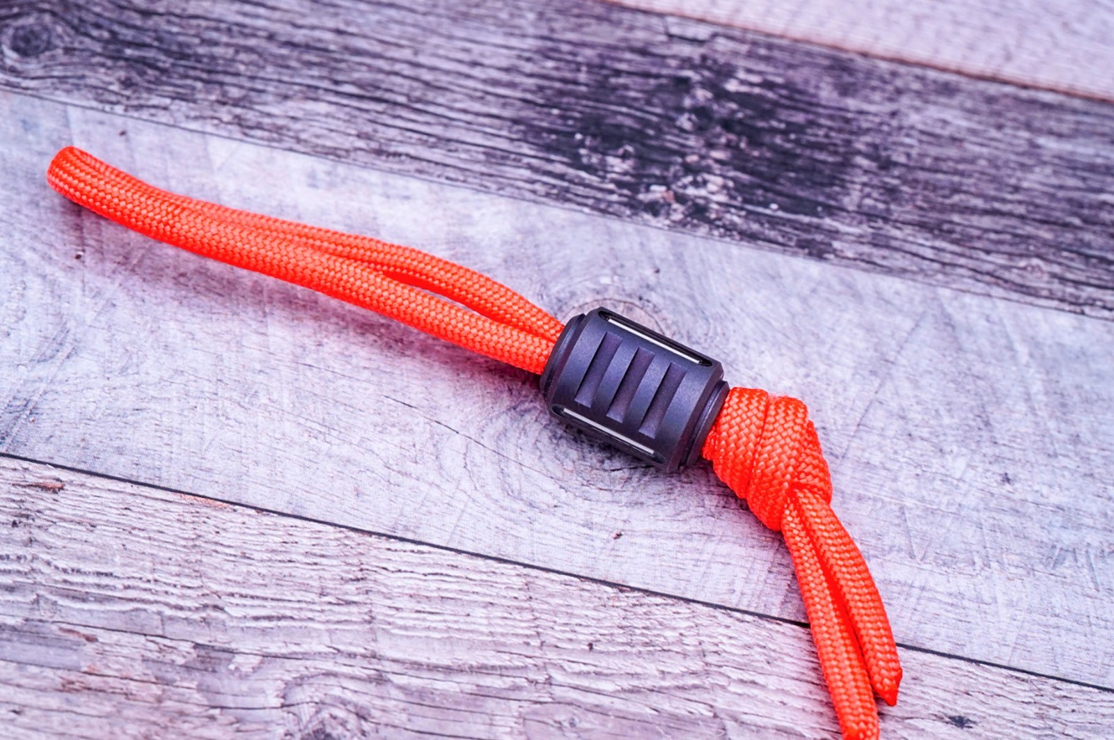 Berlin Ti Works Bead Bomb “V3” – Lanyard Bead, “Red Trit”, Bronze Ano Titanium