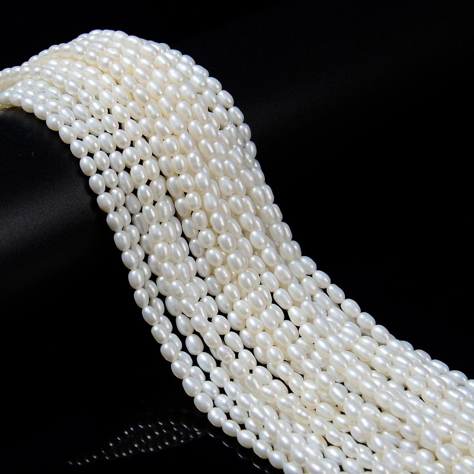 Fresh Water Pearl Rice Shape Beads Size 4x5mm 15.5” Strand
