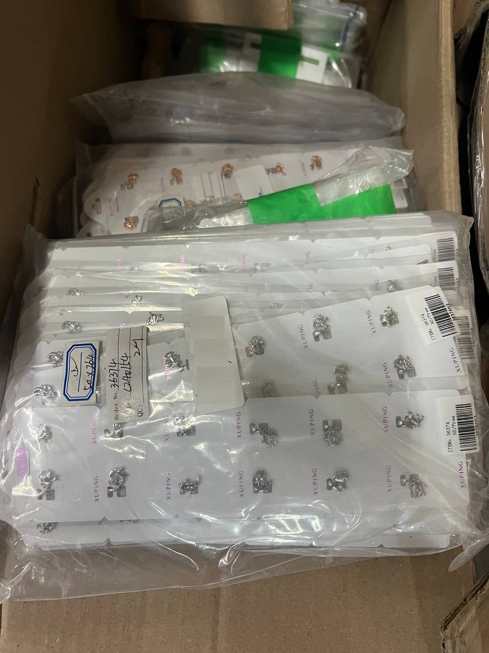 Wholesale bulk lot of 3240 zodiac sign pendants / charms.