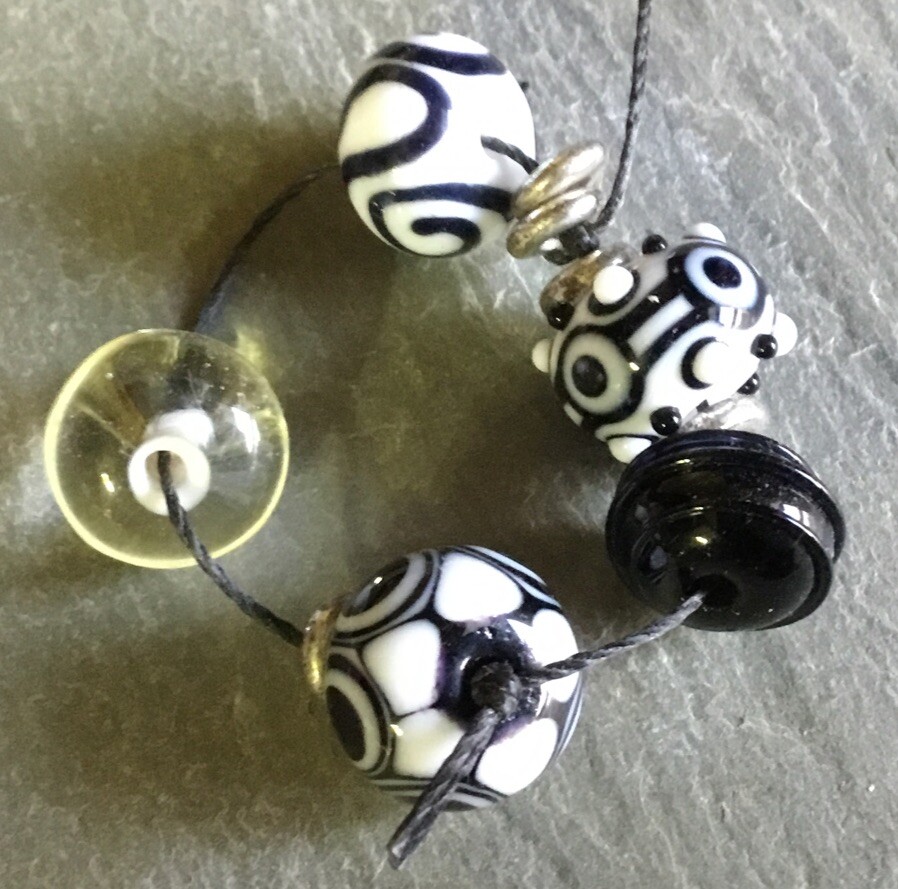 22 Lampwork glass Beads USA artisan made black white Blue Apx 10mm