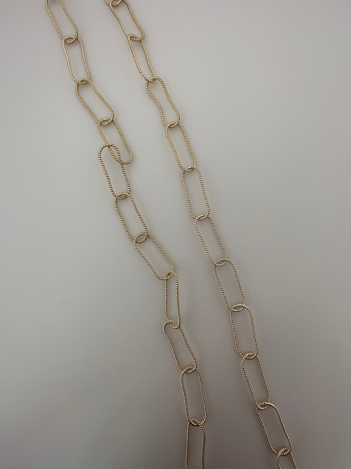 Modern Gold Finish Twisted Oval Elongated Link Chain (9 × 19 mm and 25 × 10 mm)