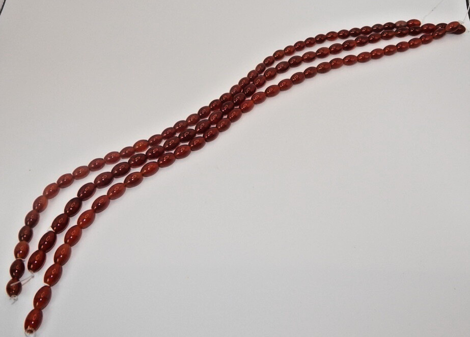 Red Agate approx 10mm x 15mm Smooth Barrel Beads (16 inch strand)