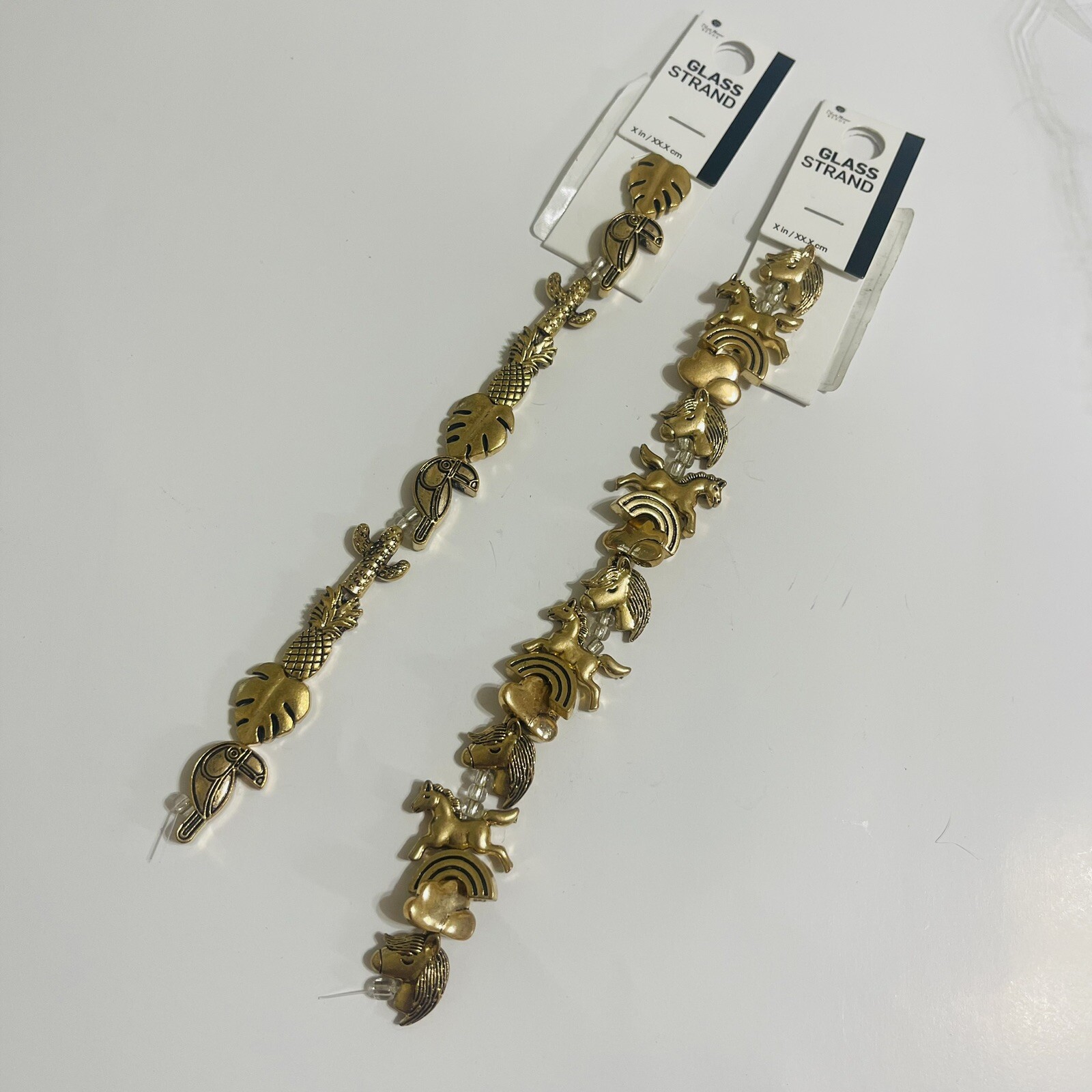 Blue Moon Metal Strand Unicorn & Tropical Gold tone and Heavy Trinkets