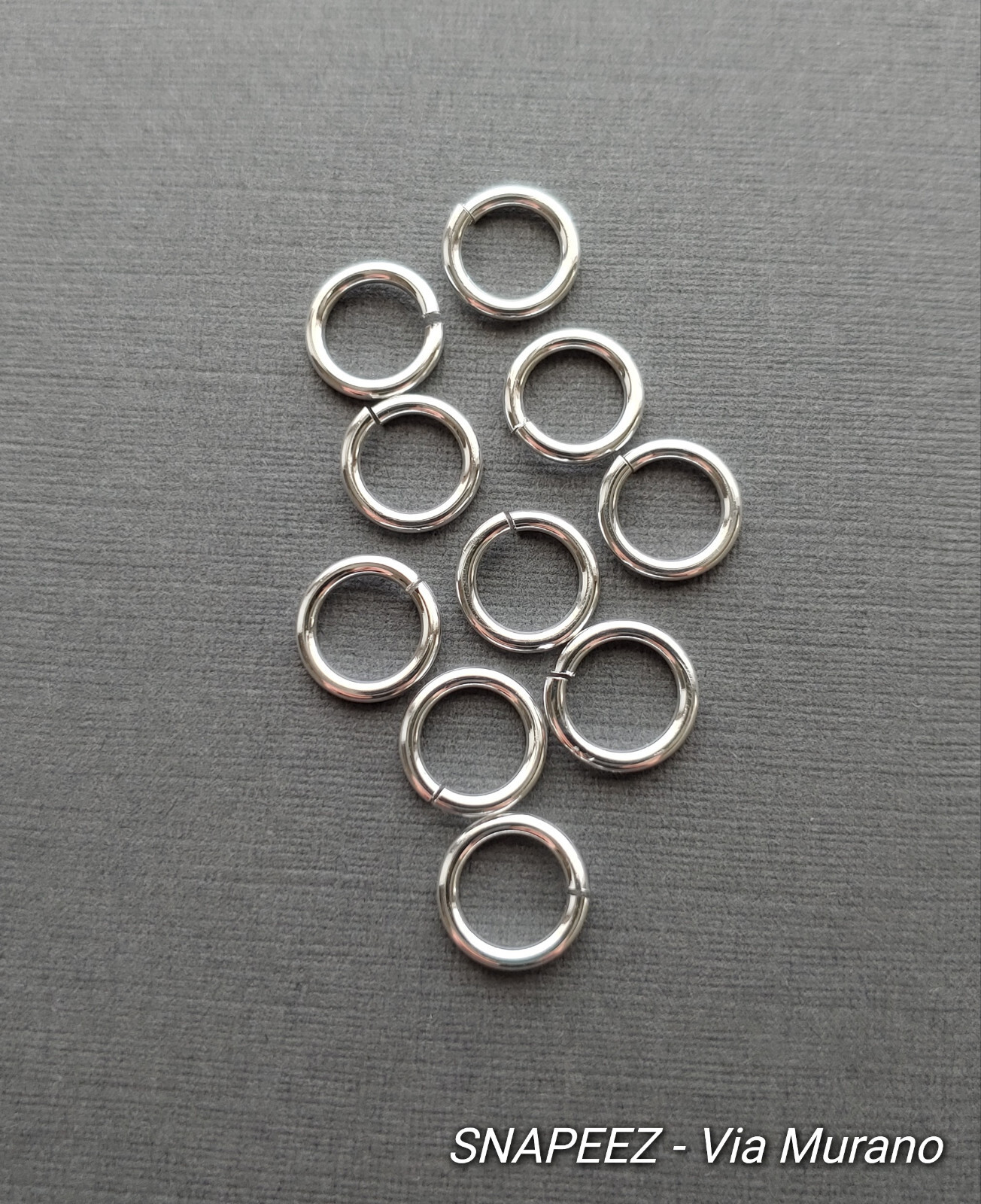 SNAPEEZ® II ULTRAPLATE® 99.9% Shiny Silver Jump Ring 9mm (10 Pk). Made in USA.