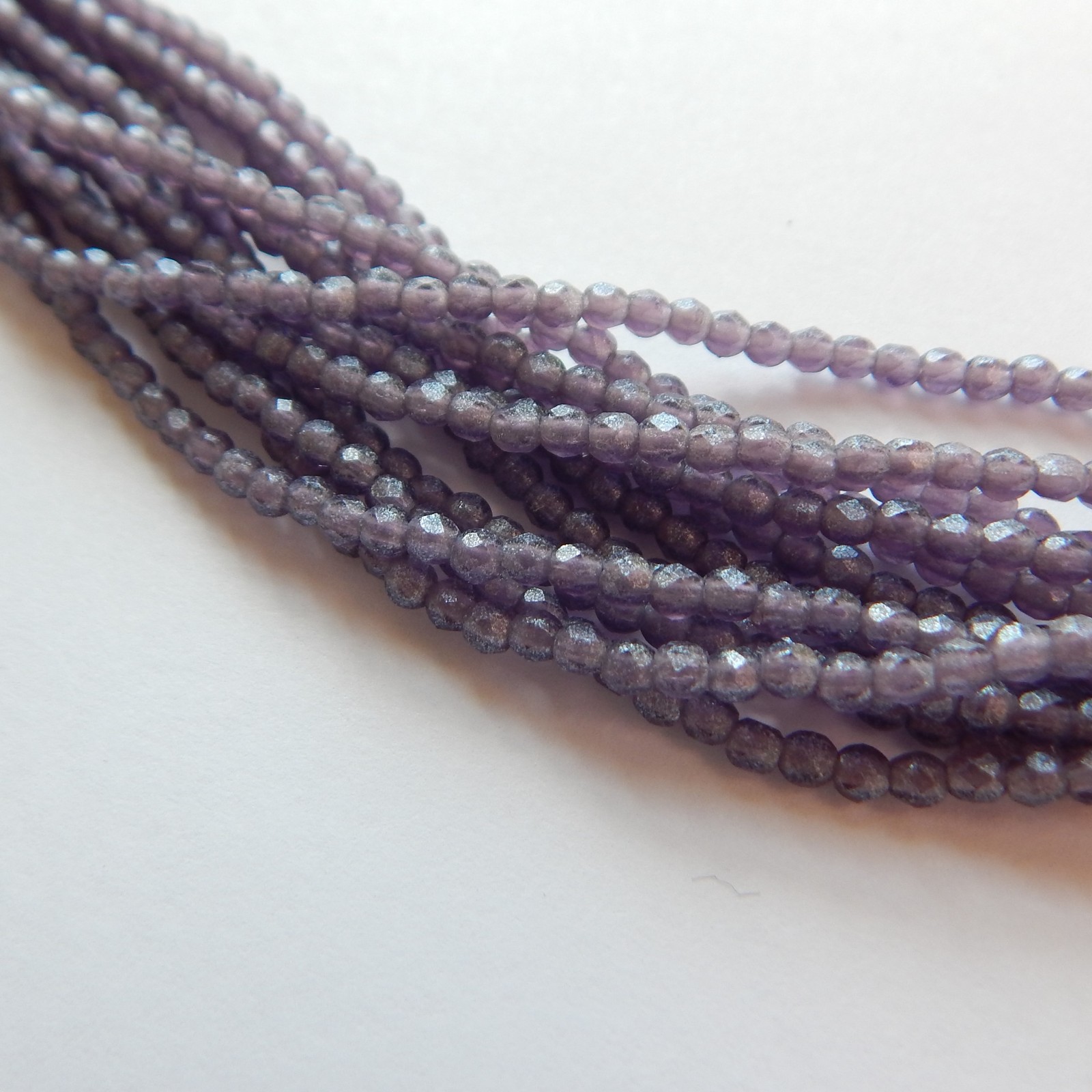 2mm (100 beads) Fire Polished Faceted – Flash Pearl Tanzanite – Czech Glass