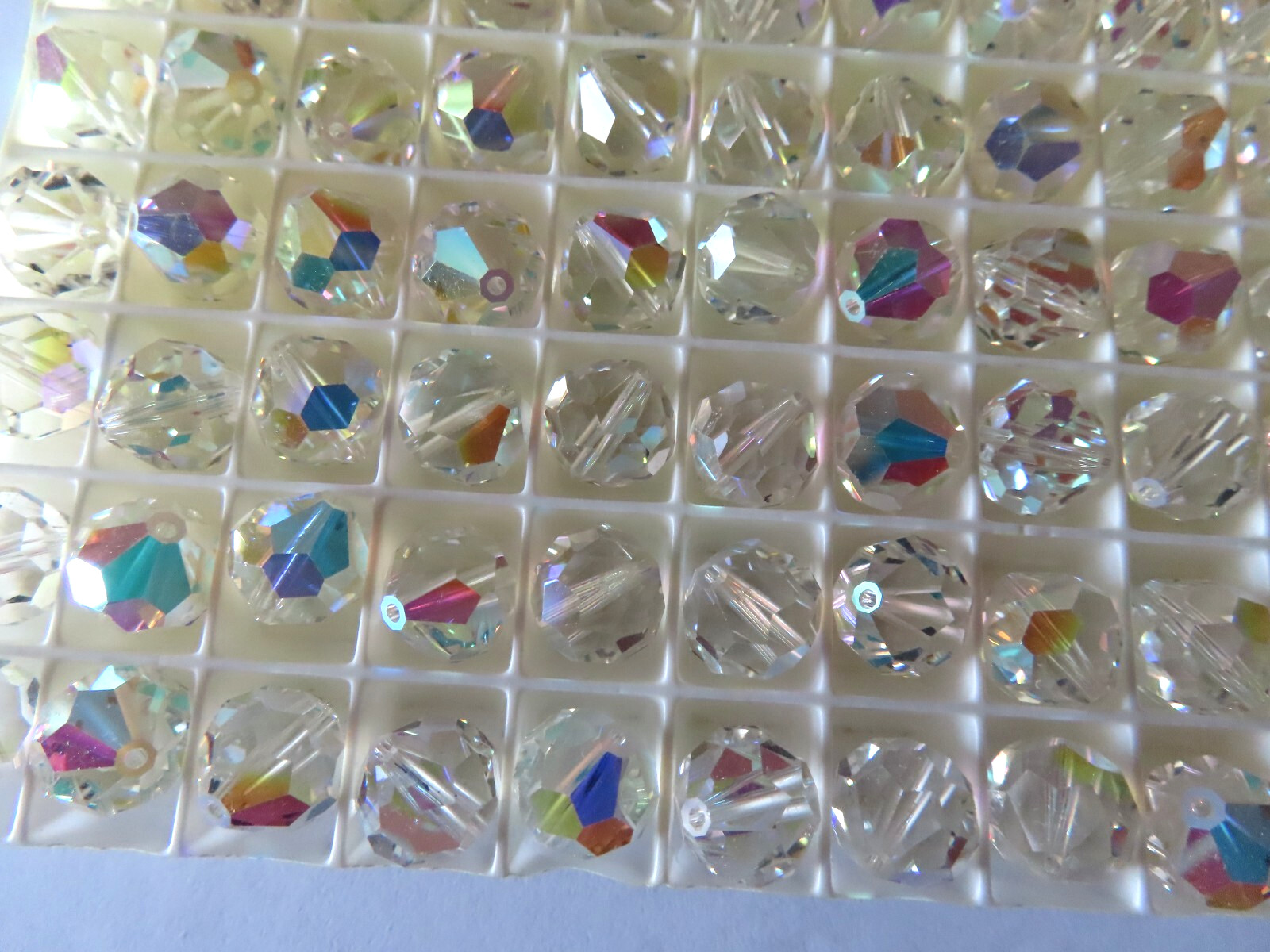 24 Swarovski vintage (retired cut) round tapered end bead 10mm Crystal AB. #5300