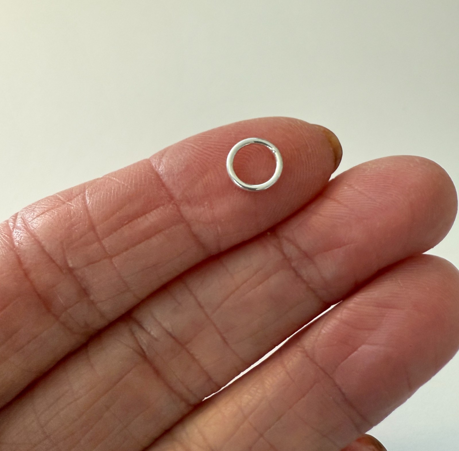 12 Sterling Silver 7mm Closed jump ring, 20 ga, Soldered, Wholesale (ri-shcj7-12
