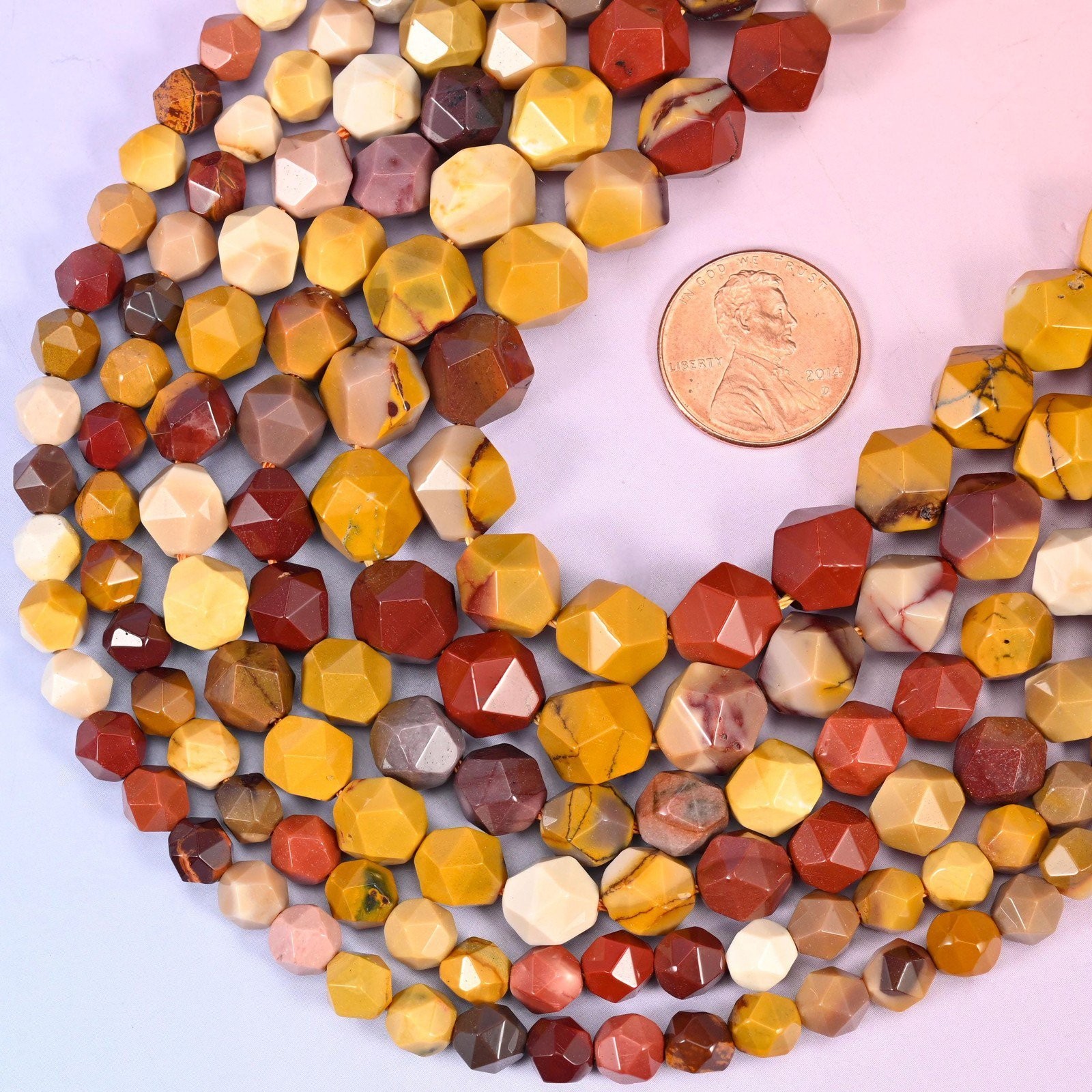 Mookaite Jasper Beads: Faceted Diamond Star Cut, 6-10mm, 15.5 inch Strand