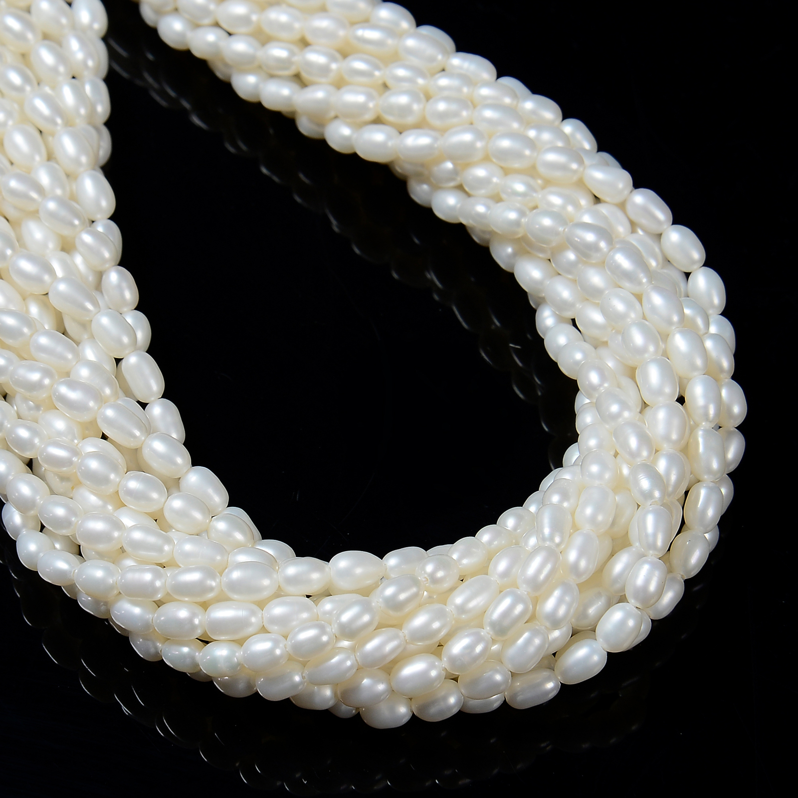 Fresh Water Pearl Rice Shape Beads Size 4x5mm 15.5” Strand