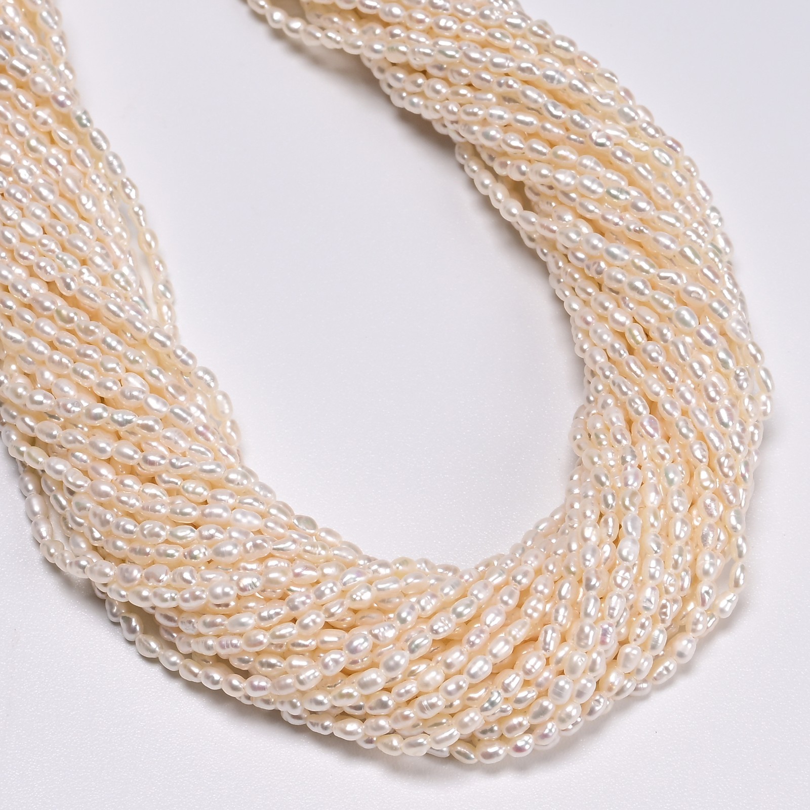 Natural White Fresh Water Pearl Rice Shape Beads Size 2-2.5×3-3.5mm 14.5”Strand