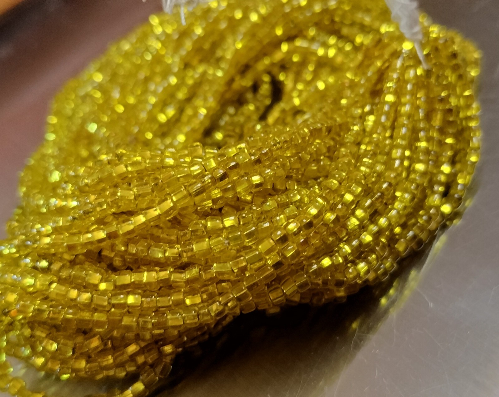 Antique trading Bohemian Cadmium Glass Beads – cut sead beads on original thread