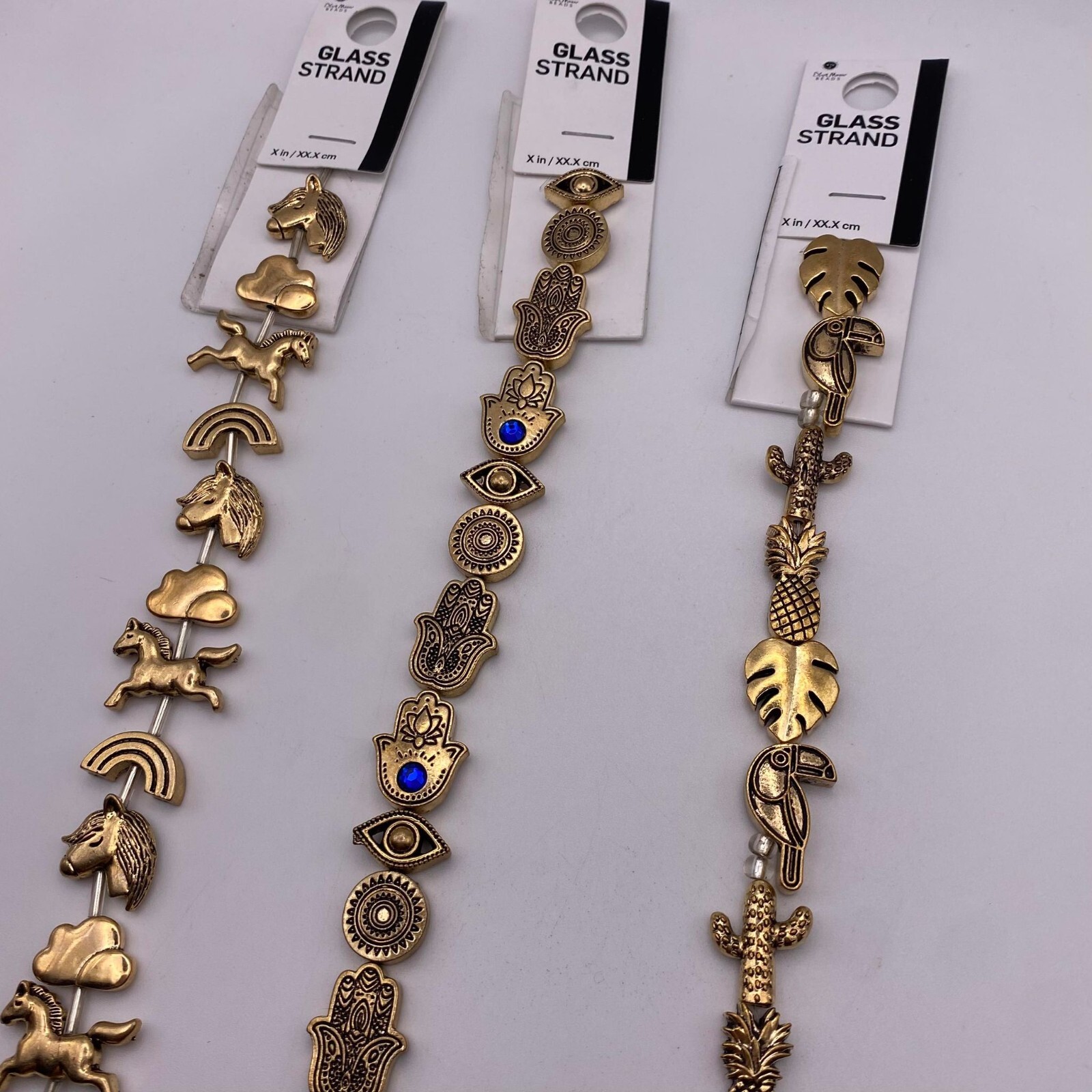 Blue Moon Metal Strand Unicorn Tropical & Amulet Gold tone and Heavy Trinkets